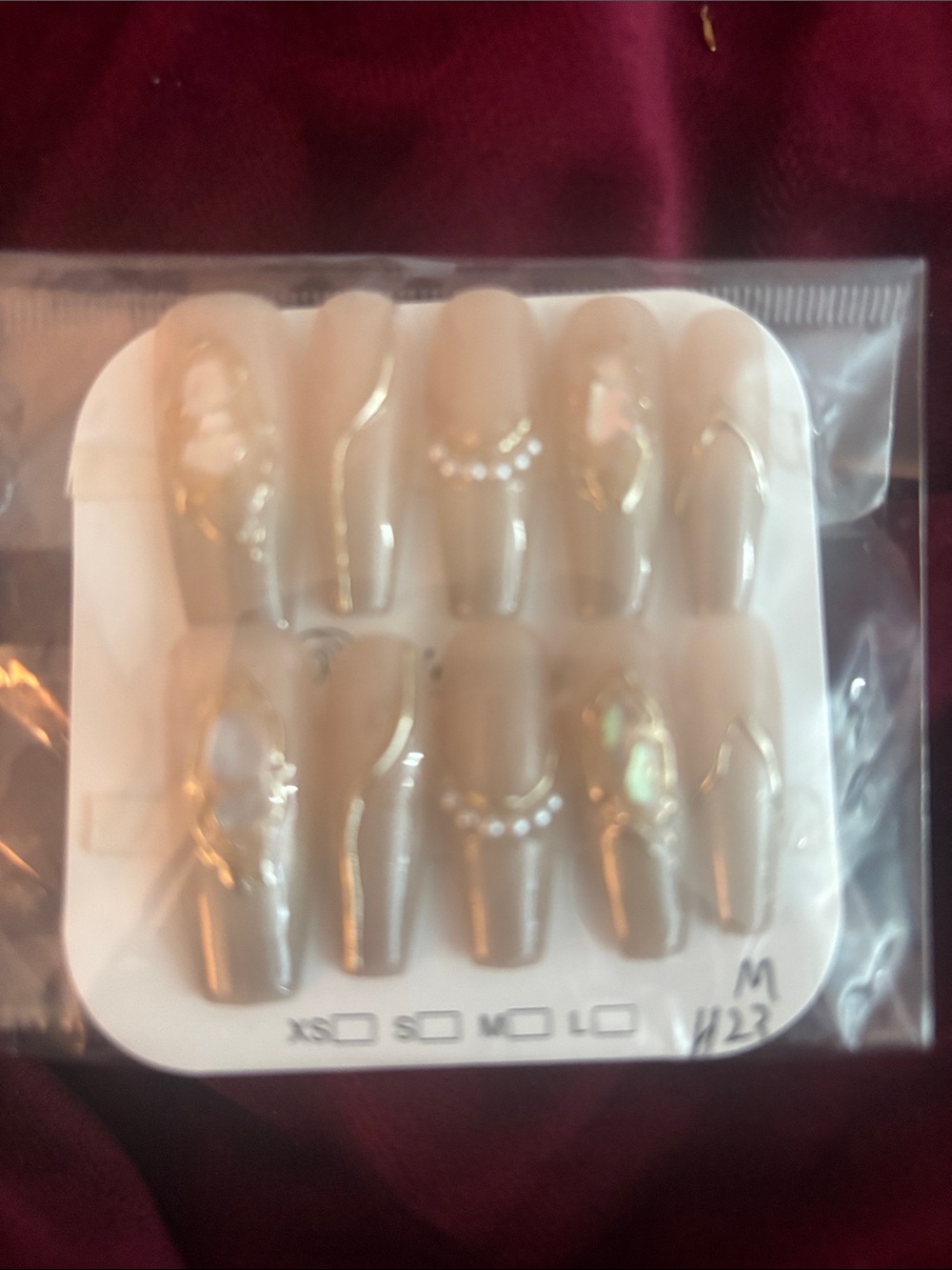 Neutral Beige Press-On Nails with Pearl and Gold Accents